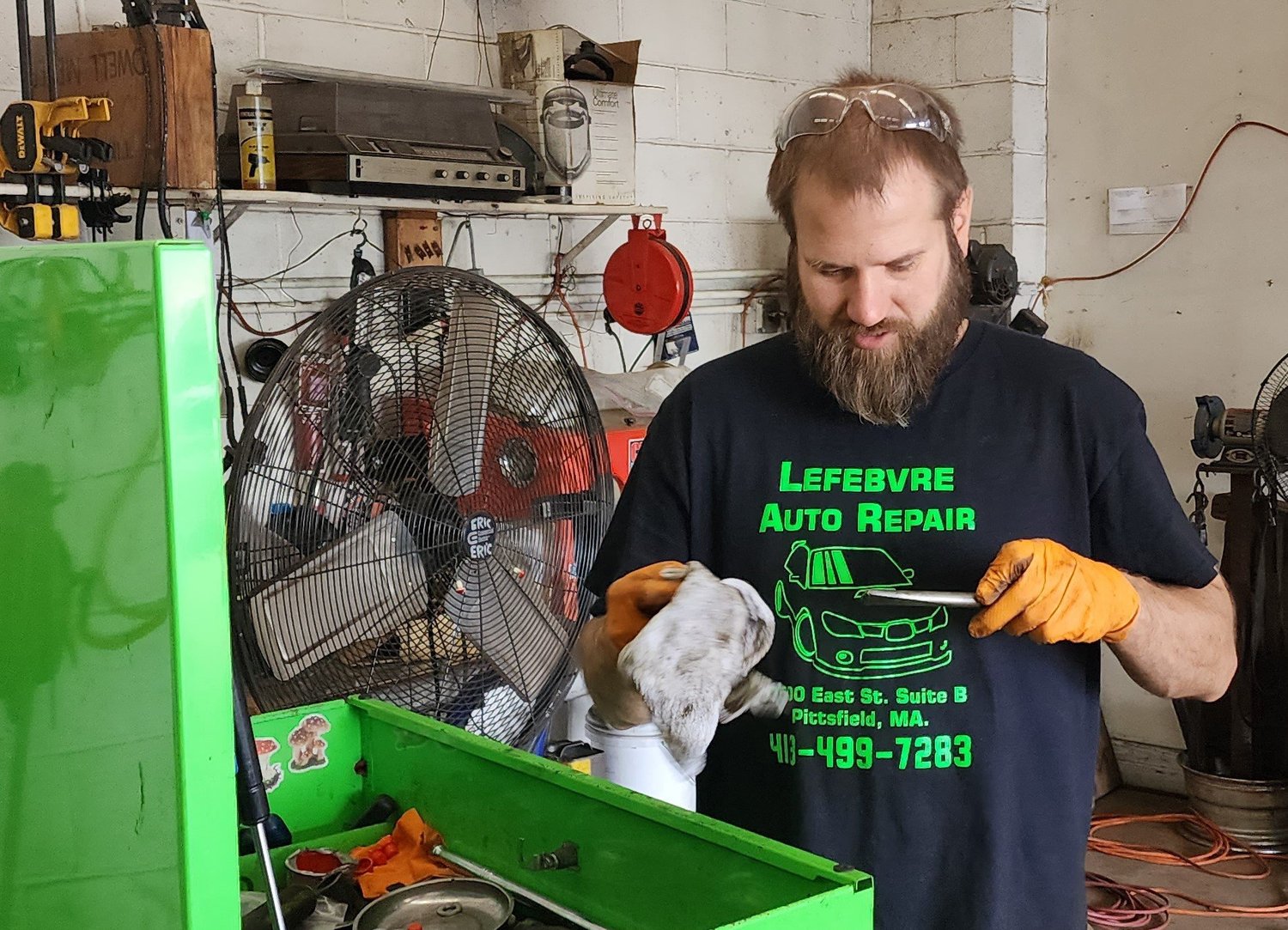 Eric Lefebvre working in the repair shop
